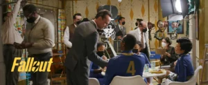 walton goggins in front of atomic 60s wallpaper with vaultees